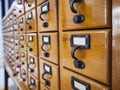 Library Card Cabinet Drawer file Index Vintage wooden cabinet with name tag label Royalty Free Stock Photo