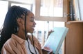 Library, education and books with black woman learning for university, knowledge and studying. College, information and Royalty Free Stock Photo