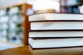 four books stacked on desk Royalty Free Stock Photo