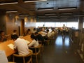 Shenzhen, China: library, male and female readers are reading