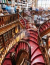 Library Lello and Irmao with large spiral staircase with red steps, Porto