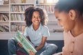 Library, reading and happy, african children learning, education and English language for group development. Books Royalty Free Stock Photo