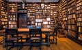 Library room with bookshelves with antique books in printing museum of Plantin-Moretus, UNESCO World Heritage Site Royalty Free Stock Photo