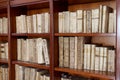 Library shelves with ancient religious books from the 1500s