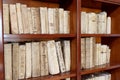 Library shelves with ancient religious books from the 1500s