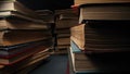 Library stack of old books, background of rows in antique shop, bookstore.