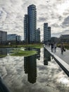 Library of trees, new Milan park. Solaria tower. Skyscrapers mirrored in the fountain. Italy