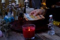 Librate with money, female hands of psychic doing witchcraft passes with euro banknotes, esoteric Oracle performs ritual of