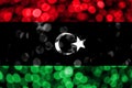 Libya abstract blurry bokeh flag. Christmas, New Year and National day concept flag