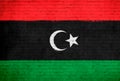 Libya flag painted on brick wall. National country flag background photo