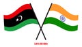 Libya and India Flags Crossed And Waving Flat Style. Official Proportion. Correct Colors