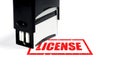 License concept, stamp with the inscription on a white background. Royalty Free Stock Photo