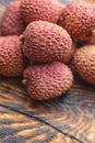 Lichee on wooden table, litchi, lychee fruit detail