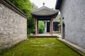 Lichen-covered flagstone paved path in ancient Chinese buildings