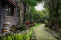 Lichen-covered footpath outside building