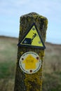 Lichen covered Signpost. Vanguard Way Walking route