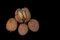 Lichi fruit with fresh juice on black table Royalty Free Stock Photo