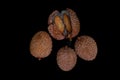 Lichi fruit with fresh juice on black table Royalty Free Stock Photo