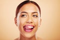 Lick, teeth or happy woman with tongue, smile or thinking of dental wellness against a studio background. Person, mouth Royalty Free Stock Photo