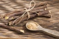 Licorice powder and roots - Glycyrrhiza glabra Royalty Free Stock Photo