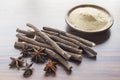 licorice root and flour and anise on the table Royalty Free Stock Photo