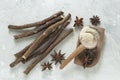 licorice root and flour and anise on the table Royalty Free Stock Photo