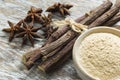 .licorice root and flour and anise on the table Royalty Free Stock Photo