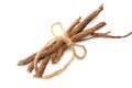 licorice roots on white background