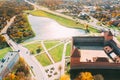 Lida, Belarus. Aerial Bird`s-eye View Of Cityscape Skyline. Lida Castle In Sunny Autumn Day. Famous Popular Historic