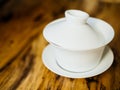 Lidded Chinese gaiwan teapot with saucer Royalty Free Stock Photo