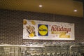 LIDL Grocery stroe at night holiday banner on the wall