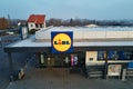 Closed supermarket with Lidl logo, aerial view