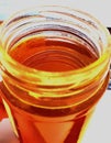Lidless Glass Jar Full of Delicious Honey Royalty Free Stock Photo