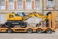 Liebherr 912 compact excavator on transportation trailer Royalty Free Stock Photo