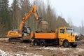 Liebherr Crawler Excavator Loads Sisu Truck