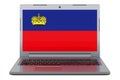 Liechtensteiner flag on laptop screen. 3D illustration