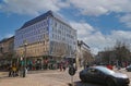 View over square on modern buildings against blue winter sky focus on big building Royalty Free Stock Photo