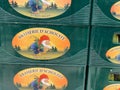 Closeup of stacked beer crates with logo lettering of belgian beer brand achuffe