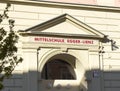 Lienz, Austria - September 18, 2025: Mittelschule Egger-Lienz school building entrance with classical architecture and decorative Royalty Free Stock Photo