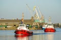 Liepaja, Latvia- May 08, 2023: Towmar Baltic Tractor type tugs TAK-1 and TAK-7 in Liepaja harbor