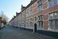 LIER, BELGIUM - APRIL 2016: typical beguine houses and cobblestone street