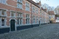 LIER, BELGIUM - APRIL 2016: typical beguine houses and cobblestone street