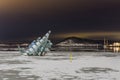 `She lies in Oslo`, a sculpture in the frozen harbor ice next to Royalty Free Stock Photo