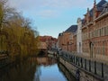 Lieve canal with historical buildings and weeping willows in Ghent