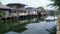 Daily life activity in Small houses on canal bank in the city Royalty Free Stock Photo