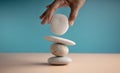 Life Balance Concept. Hand Setting White Natural Zen Stone Stack. Balancing Mind, Soul and Spirit Royalty Free Stock Photo