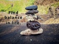 Life balance quote. Inspirational motivational quotes- Find balance in life. Relax and be balance. With sea stones balance Royalty Free Stock Photo