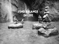 Life balance quote. Inspirational words - Find balance in life. With background of waterfall & stones formations in black and Royalty Free Stock Photo