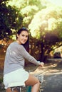 Life is a beautiful ride. Portrait of an attractive young woman riding her bicycle outside. Royalty Free Stock Photo