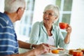 Life begins after coffee. Cropped shot of a senior couple eating breakfast. Royalty Free Stock Photo